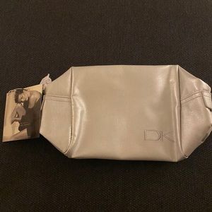 NWT. DONNA KARAN PLATINUM COSMETIC BAG